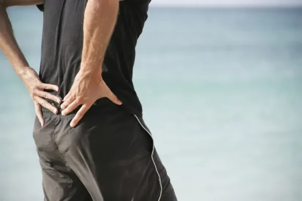 thumbnail_low_back_pain_man_exercise_clothing_Photo_Credit_Jan-Otto_Photo_Source_iStock-172450241 رگ سیاتیک درمان خانگی و راهکارهای آن