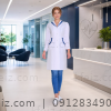 روپوش پزشکی زنانه مدل یگانه با خرجکار سرمه‌ای